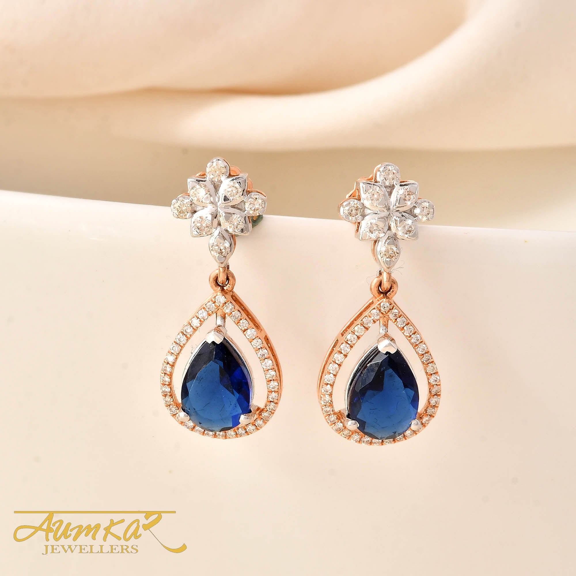 Elegant Blue Stone Danglers Adorned With Sparkling Round Diamonds